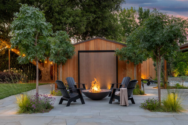 Firepit in backyard at sunset